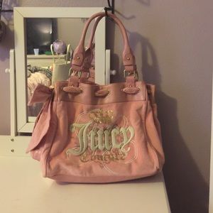 Pink Juicy Couture tote with a bow