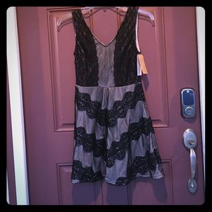 New with tags black and nude lace dress