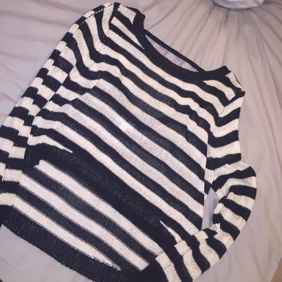 Open back loose sweater/top.