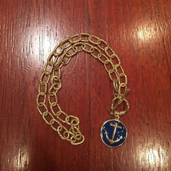 Gold necklace with navy anchor dangle