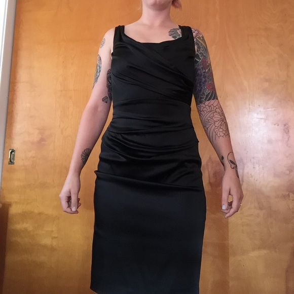 Little black dress, worn twice, dry cleaned only.