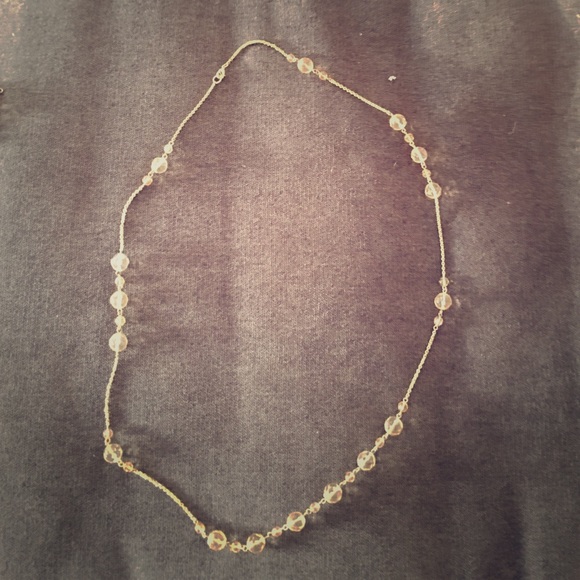 Long golden necklace, looks super holiday!