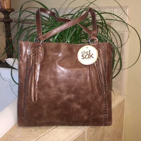 New SAK teak brown leather purse.