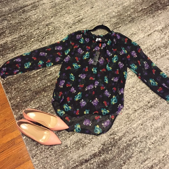 Beautiful colorful blouse. Polyester. NWT