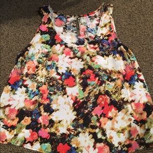 Floral top with slit in the back