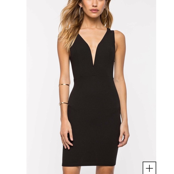 Little black dress with a plunge 😈