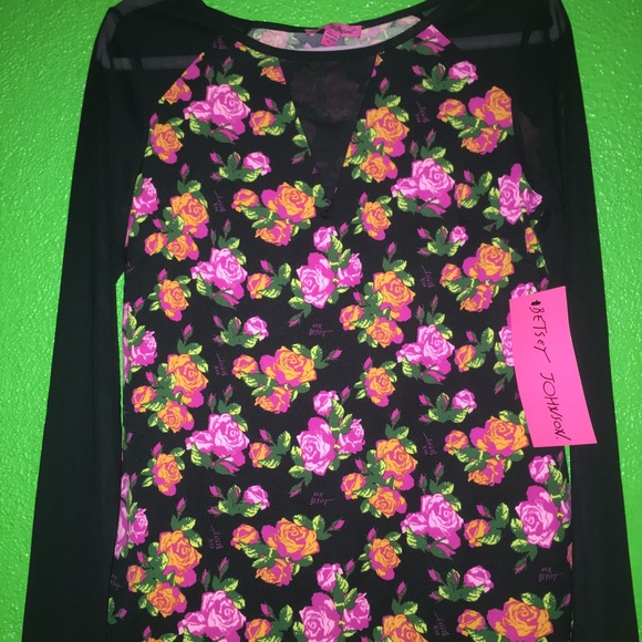 Betsy Johnson floral blouse with sheer sleeves.