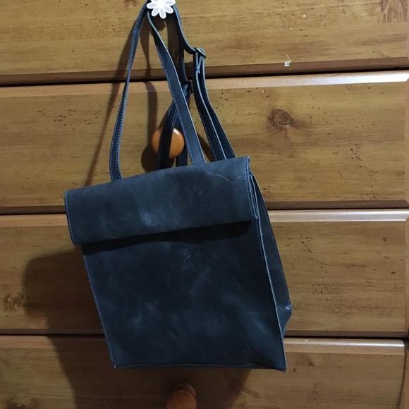 Distressed black leather backpack. NEVER BEEN USED