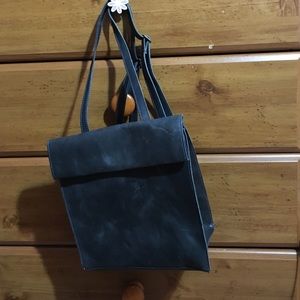 Distressed black leather backpack. NEVER BEEN USED