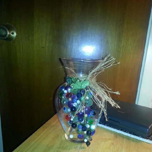 Glass vase with jeweled grapes..