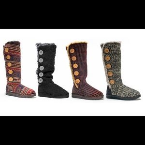 Muck Luks with hard bottom.