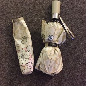Coach umbrella with cover, matches wristlet