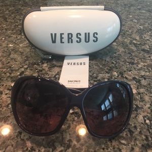 Purple Versace Versus sunglasses. New condition.