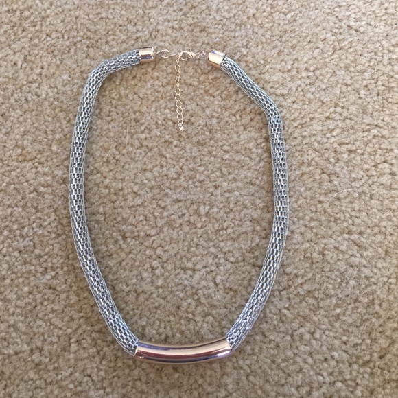 Silver and rose gold tone necklace.