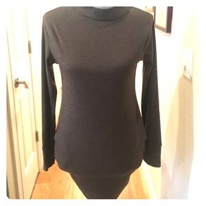 Turtle neck. Brown with pockets