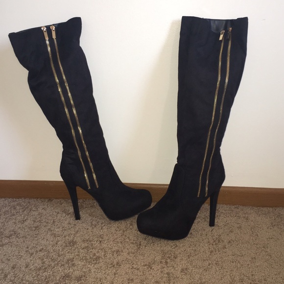 Stiletto boots with gold detail