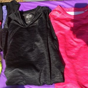 Two Nike pro combat women's long sleeve shirts