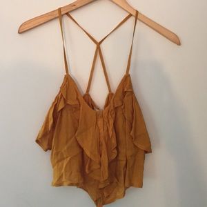 Mustard yellow crop top.