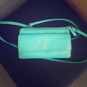 Teal Fossil wallet cross body.