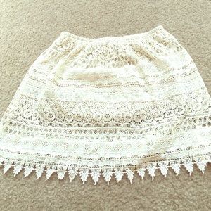 Lace overlay mini skirt.