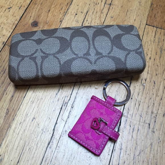 Coach reading glasses with case and keychain.