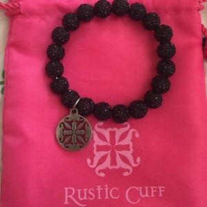 Black rustic cuff with sandbag