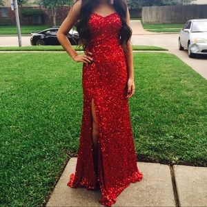 Beautiful red sequined dress with a slit