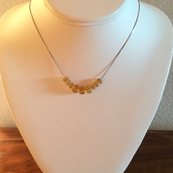Gold necklace with yellow/gold beads