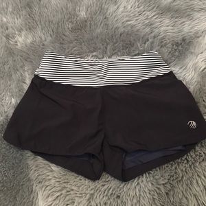 Black athletic shorts with built in tight shorts
