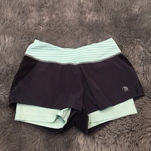 Mint and black athletic shorts
