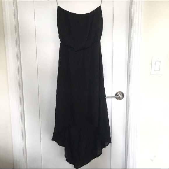 Super cute long tube black dress.