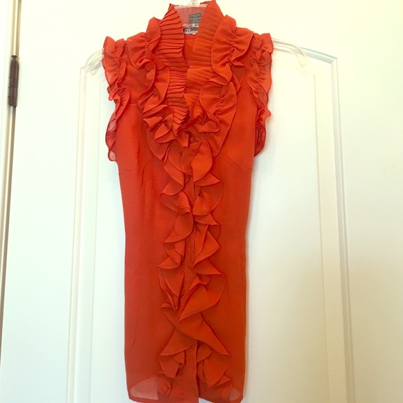 Orange ruffle blouse