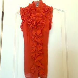Orange ruffle blouse