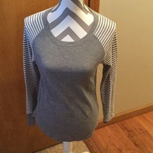 Long sleeve gray thermal shirt.