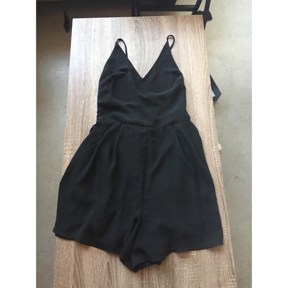 Lush black romper with pockets