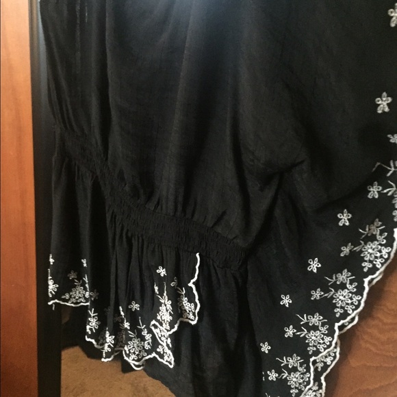 Super cute floral accented one sleeve shirt