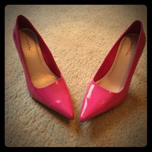 Hot pink pointy toed stilettos