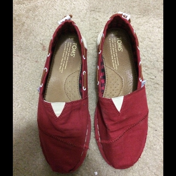 Toms red canvas shoes