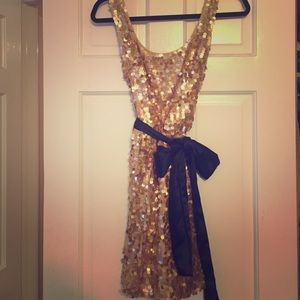 Gold sequin dress with black satin belt