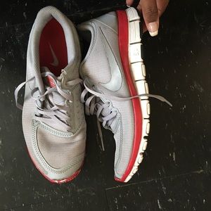 Gray and Pink NIKE free 5.0 size 8 in women's