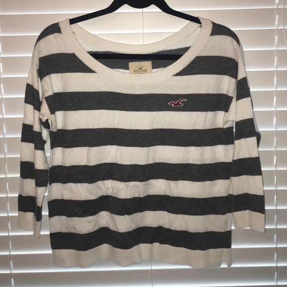 grey/white high-low sweater.