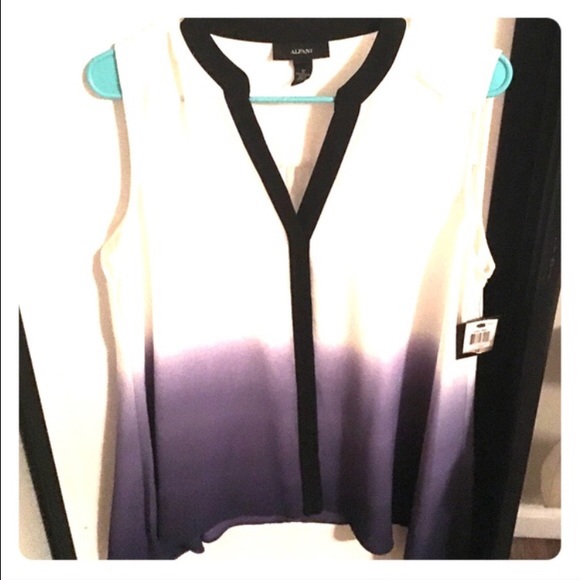Purple and white tunic. New with tags. Size 12