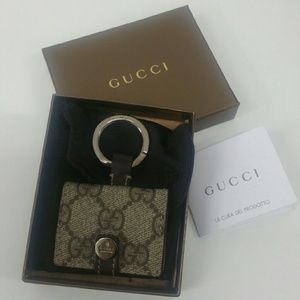 Gucci photo holder and key chain.