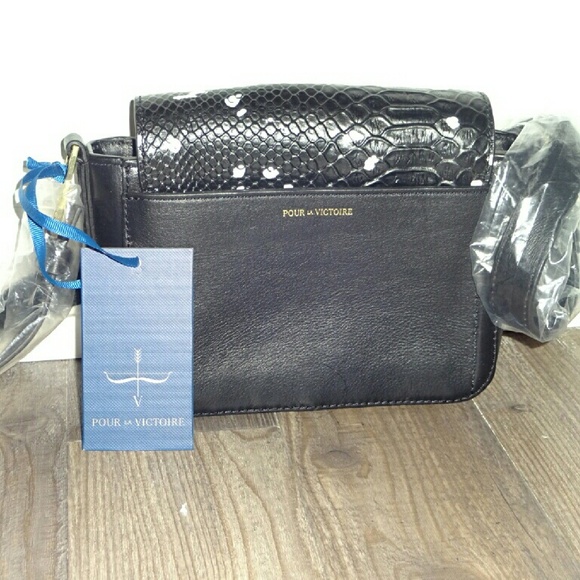 Crossbody/handbag new with tags. Never used.