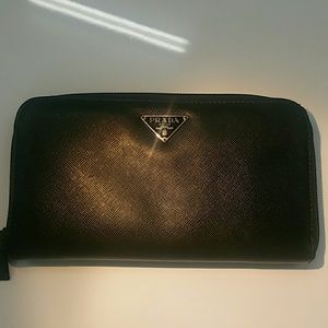 Prada  wallet zip around.