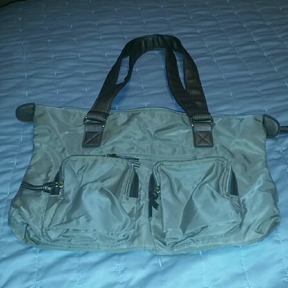 ?? Avon Bronz and Gold Water Proof Bag
