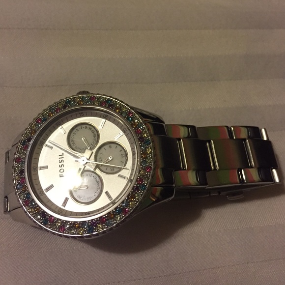 Silver and multicolored tho stone fossil watch