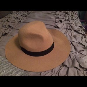 Tan and black hat