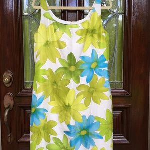 Silk dress in blue/green floral. Fringe at hemline