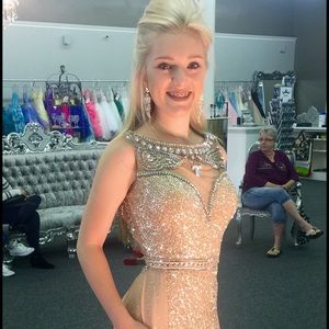 Sherri Hill Champagne color dress.